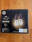 2 Pack Ge Vintage Style Amber Glass Warm Candle Light Dimmable 60w 560 Lumens. Fixed Price $9.00.
