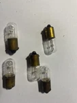 One (1) Ge - 43 Miniature Automotive Light Bulb W/vintage Brass Casing. Fixed Price $7.95.