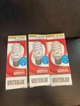 60 Watt Replacement Compact Fluorescent Light, Soft White 2700k, 1040 Lumens 3pk. Fixed Price $9.99.
