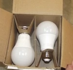 A-6. Amazon Basics A19 Dusk To Dawn Sensor Led 2 Count (pack Of 1), Daylight T26. Fixed Price $5.00.