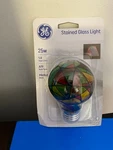 New Ge Stained Glass Light Bulb A19 Medium Base 25 Watt Hand Painted. Fixed Price $11.99.