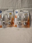Set Of 2 Ge Auradescent 40w Flame Tip Light Bulbs Soft White Pack Med Base. Fixed Price $50.00.